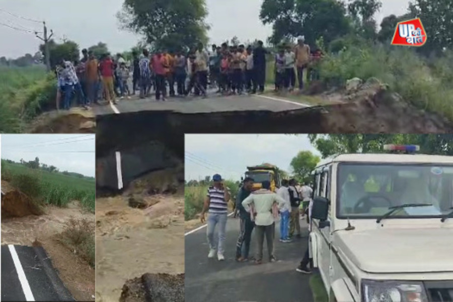 Road broken due to negligence of Irrigation Department, fields and barns submerged!